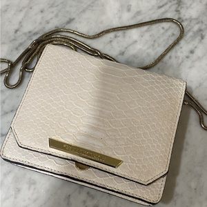 Rebecca Minkoff white purse. Some markings on the inside and outside